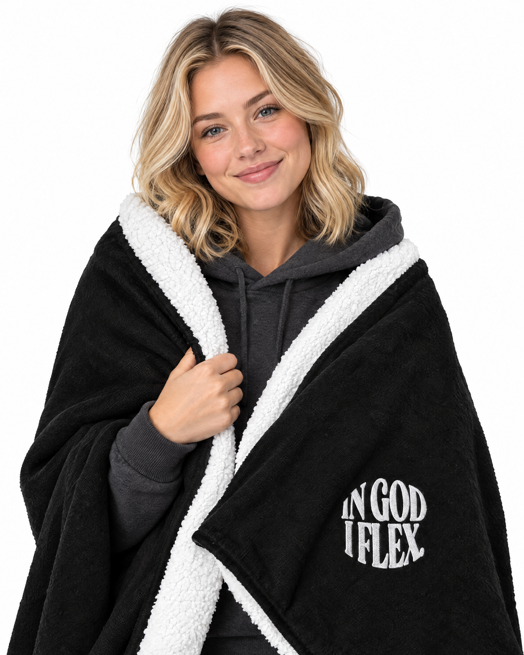 IGIF Sherpa Blanket in Black, wrapped around a model